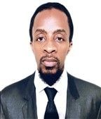 Man in a suit and tie with a white background.